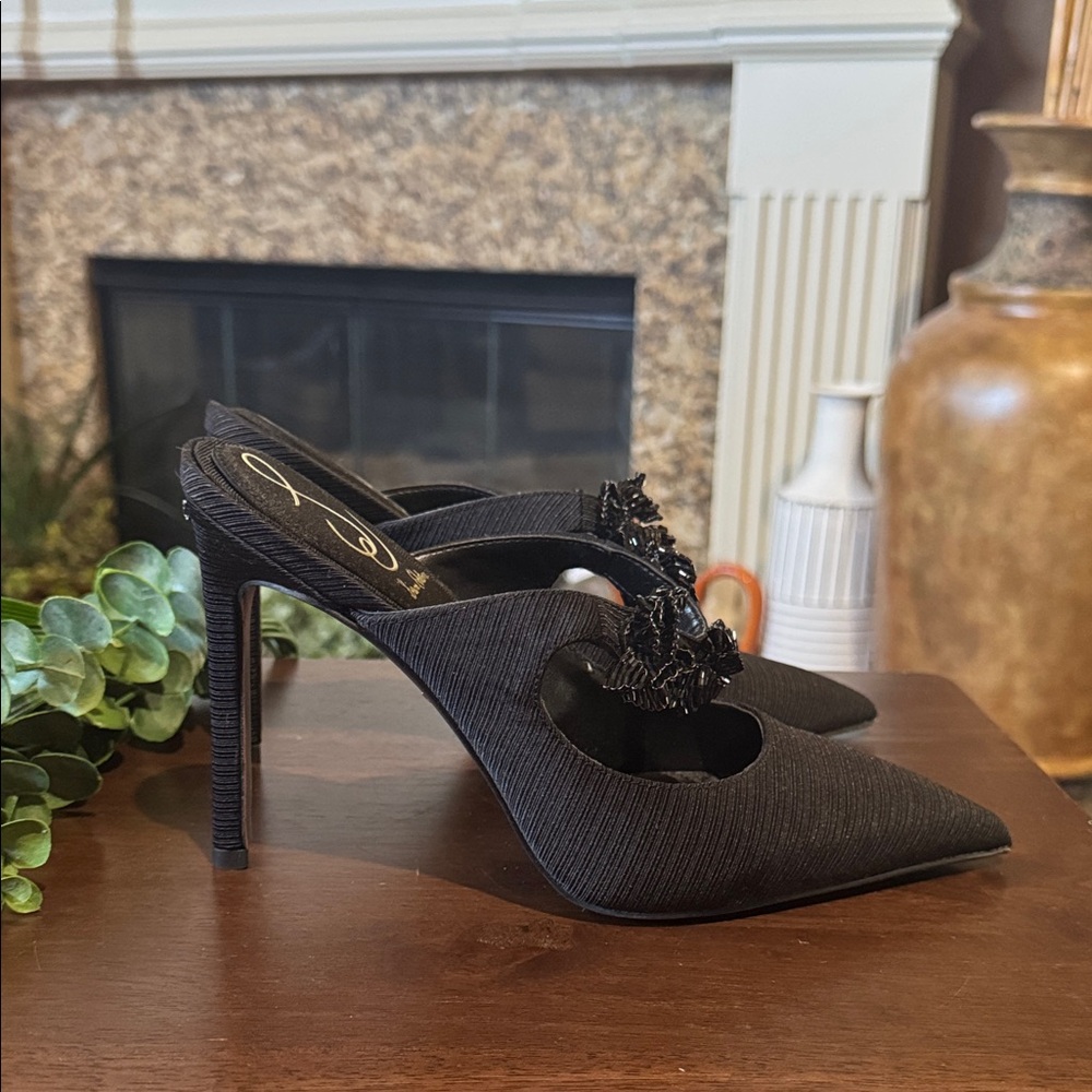 Sam Edelman Amelie pointed toe mule in black with beaded floral detailing.